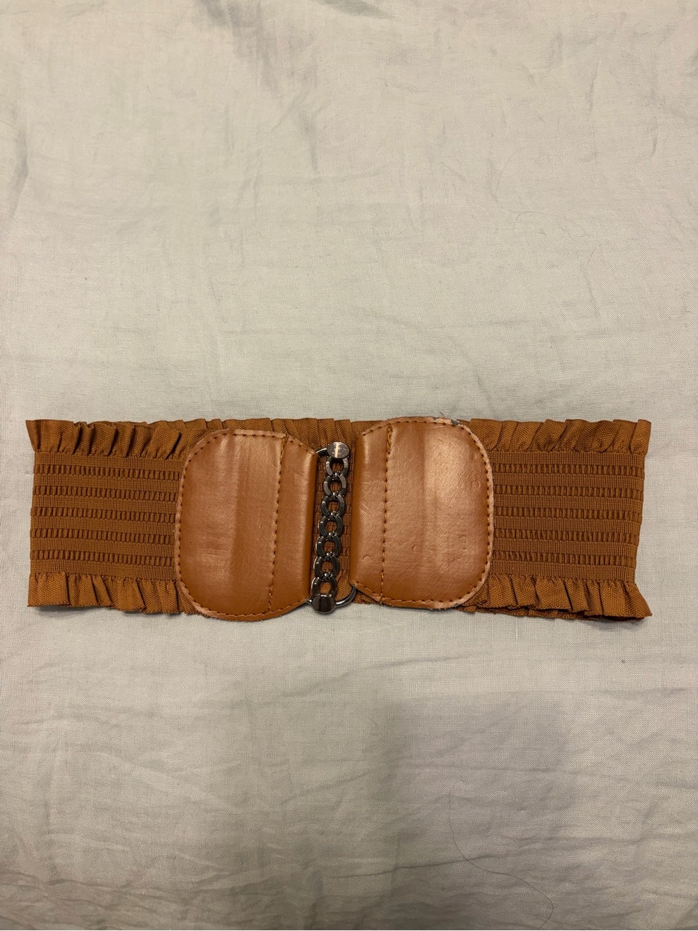 Brown and silver elastic waist belt